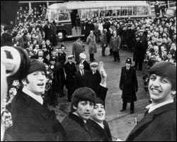 The Beatles arriving back at Heathrow 