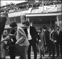 The Beatles arriving back at Heathrow 