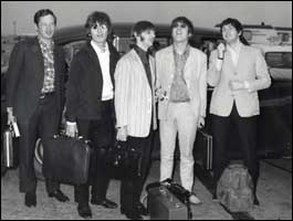 Brian Epstein and the Beatles departing 