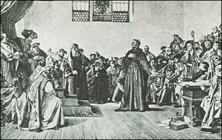 Saint Martin Luther defending his writings before the Emperor Charles V at the Diet of Worms in 1521.
