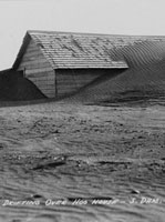 A farm covered in dust in Cimarron County, Oklahoma.