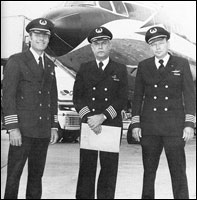 Captain Elmer Bennett (center) flew 