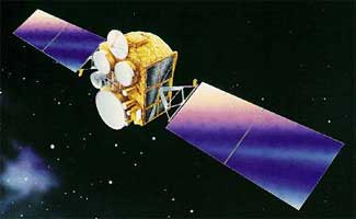 Communications satellite in a stationary position or slot high above the earth. 