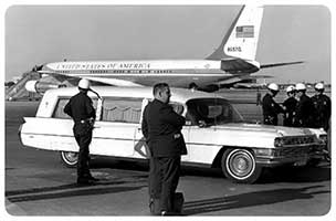 The hearse arrives at Love Field. In the background can be seen the 