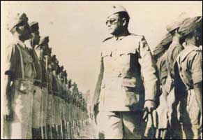 Bose reviewing troops of the Indian Liberation Army, Singapore, 1943.