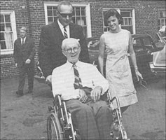 Joe and Ann Gargan with Frank Saunders. 