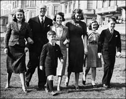 Joseph P. Kennedy with his wife and 5 children in London. 