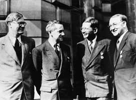Several members of the British Mission to Los Alamos: William Penney, Otto Frisch, Rudolf Peierls, and John Cockroft.