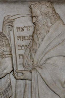 Frieze of Moses holding the 10 Commandments in the U.S. Supreme Court bench. 
