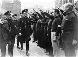 Mosley marching with British Nazis in 1936. 