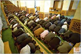 Muslims "praying" on Friday—their day to worship their idol Allah. 
