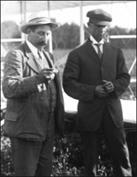 Hart O. Berg (left), the Wrights' European business agent, and Wilbur at the 