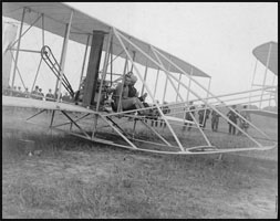 Orville Wright and Thomas Selfridge preparing for takeoff. 
